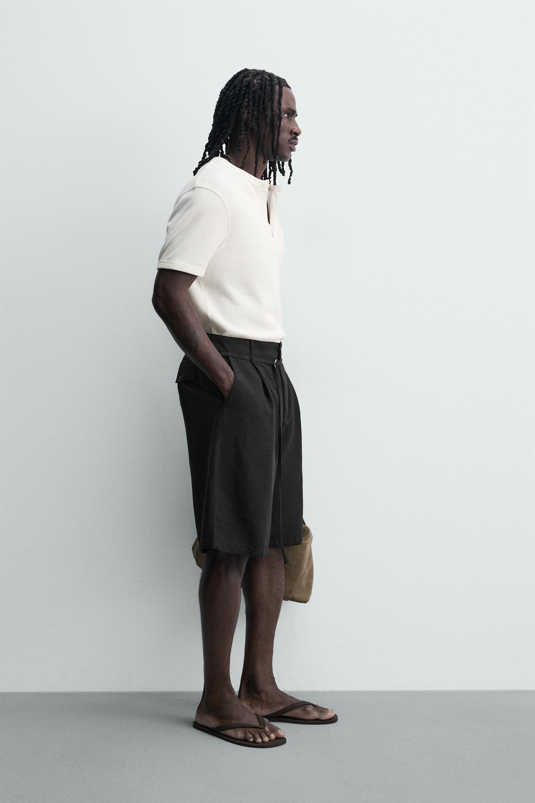 RELAXED FIT BELTED PLEATED SHORTS